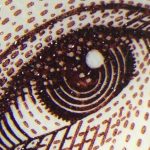 close up of a drawing of an eye on a money bank note